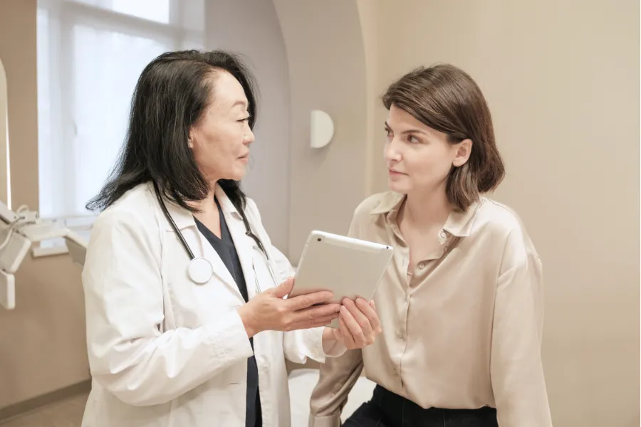 Woman talking with her doctor